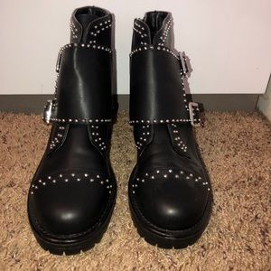 Black leather boots with silver studs.